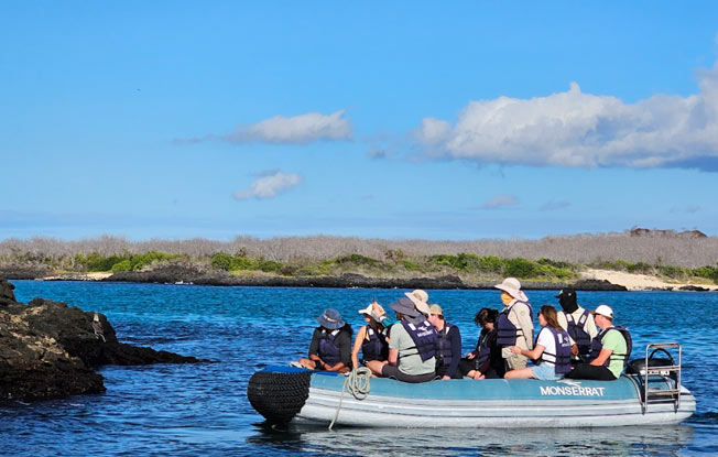 Guests enjoying a panga boat excursion, a highlight of the best Galapagos cruise expeditions.