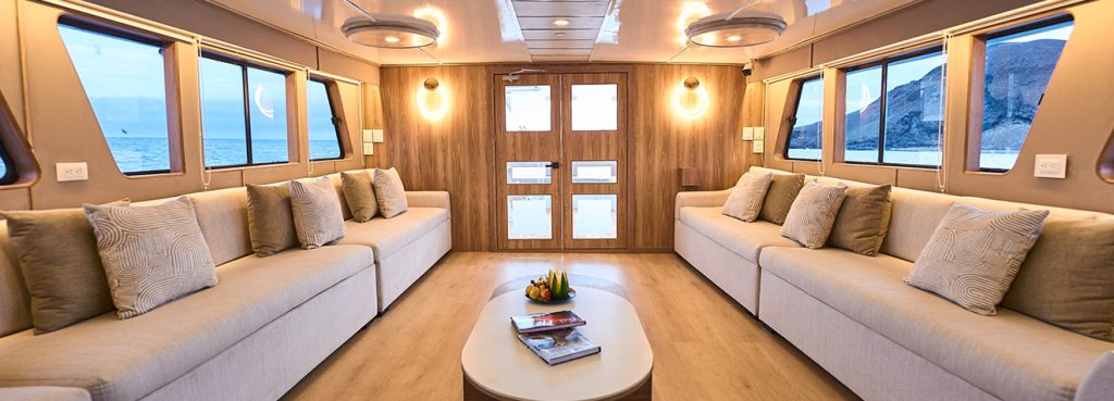 Elegant and comfortable main lounge area inside the best Galapagos cruise ship.