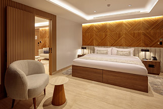 Interior view of the spacious Owner Suite, the most luxurious accommodation on the Hermes Galapagos Luxury Cruise.