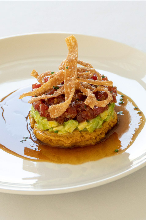 Gourmet meal—a fusion of local Ecuadorian and international dishes—prepared by the chef aboard the luxury Hermes Galapagos Luxury Cruise.