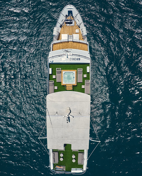 Galapagos Cruise: Aerial view of the Monserrat Yacht navigating the islands"