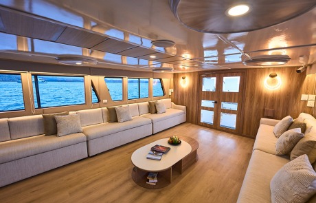 Elegant diagonal view of the Main Lounge interior on the Monserrat Yacht.