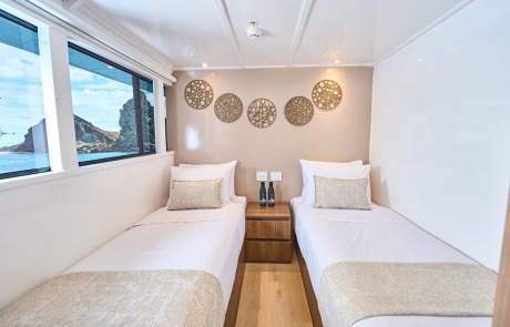 Bright and comfortable Twin Cabin on the Upper Deck of the Monserrat Yacht Galapagos Cruise.